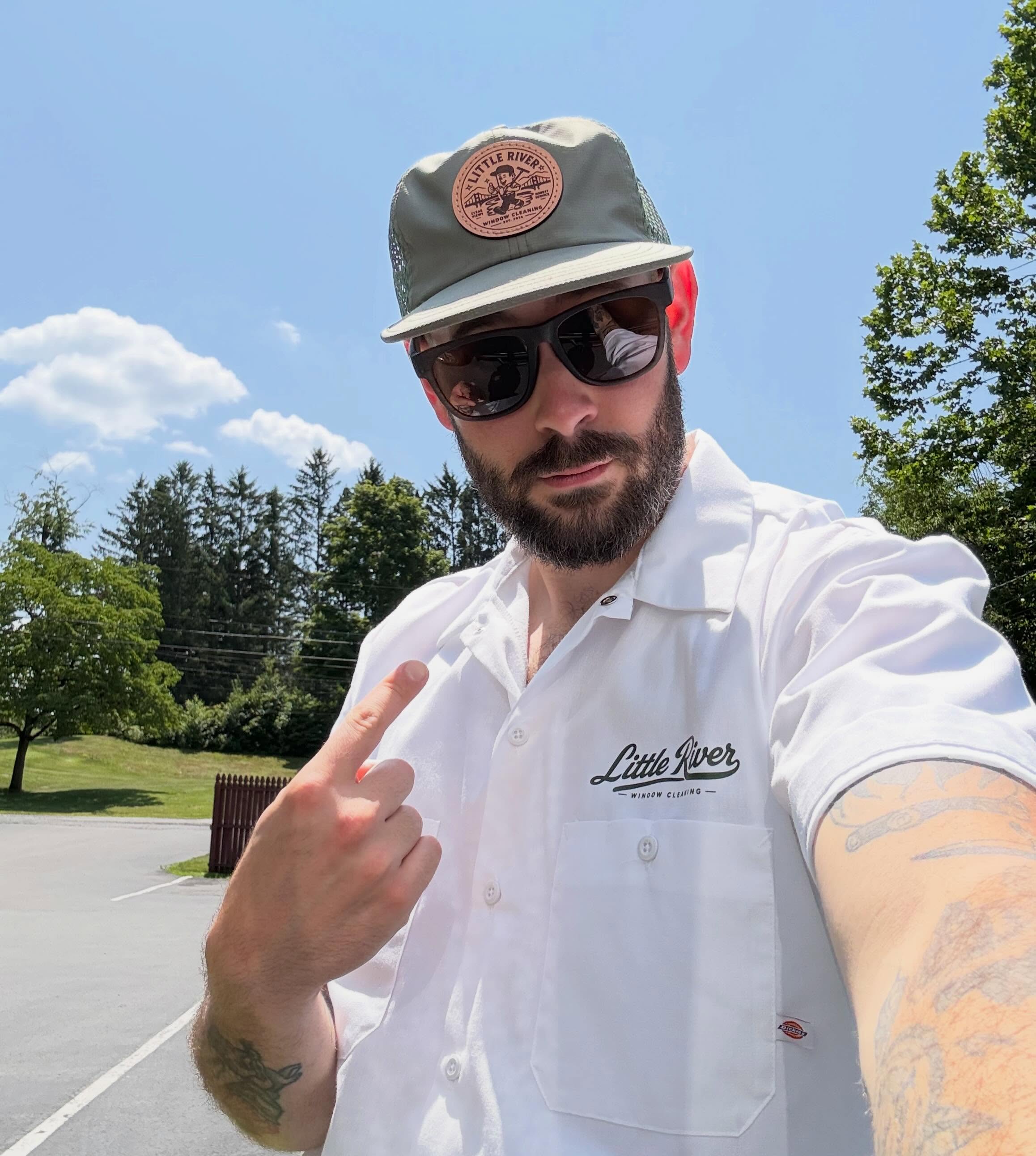 Eli, founder of Little River Window Cleaning, at work in the Hudson Valley