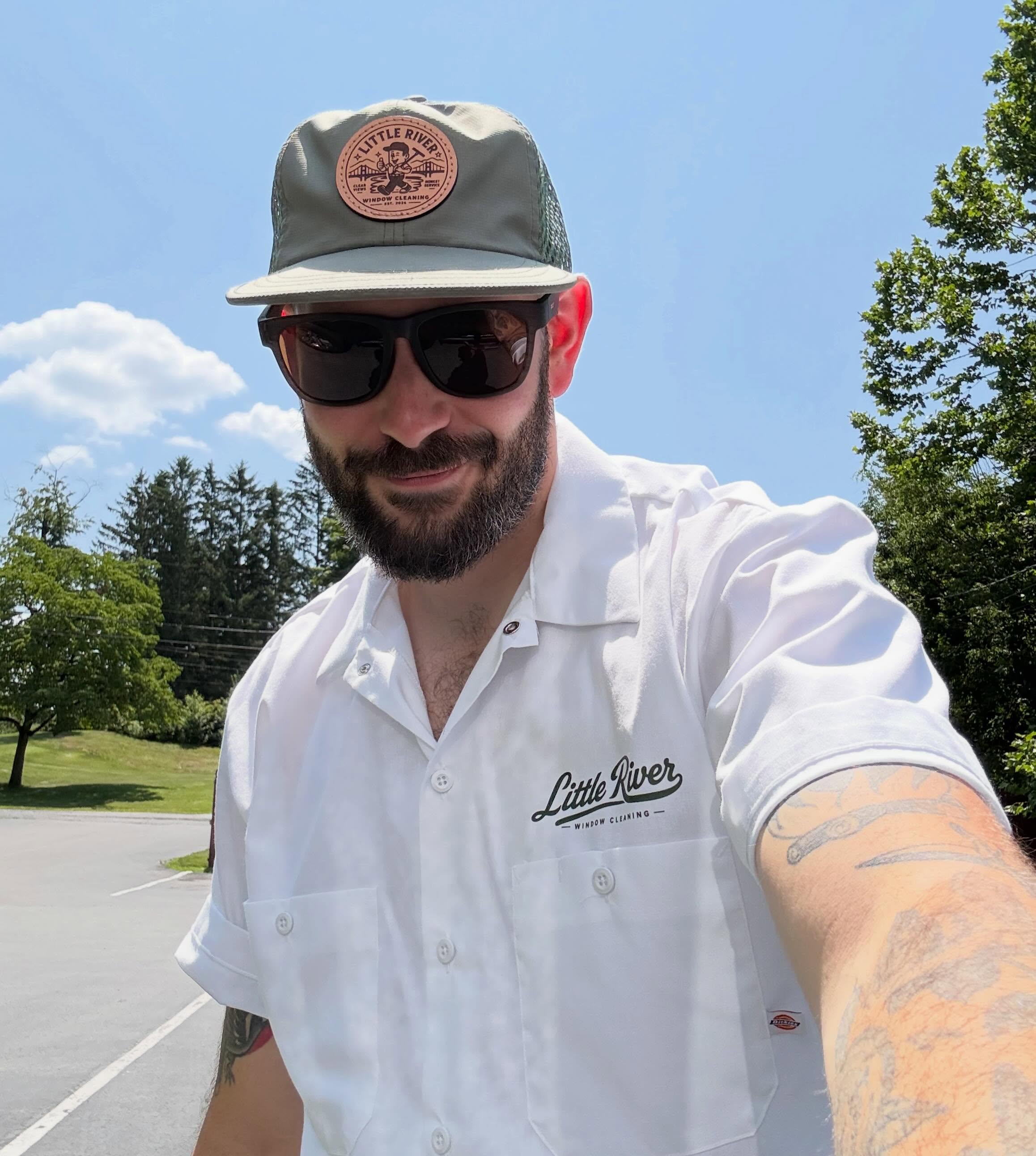 Eli, founder of Little River Window Cleaning, at work in the Hudson Valley
